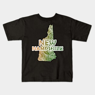 Colorful mandala art map of New Hampshire with text in green and orange Kids T-Shirt